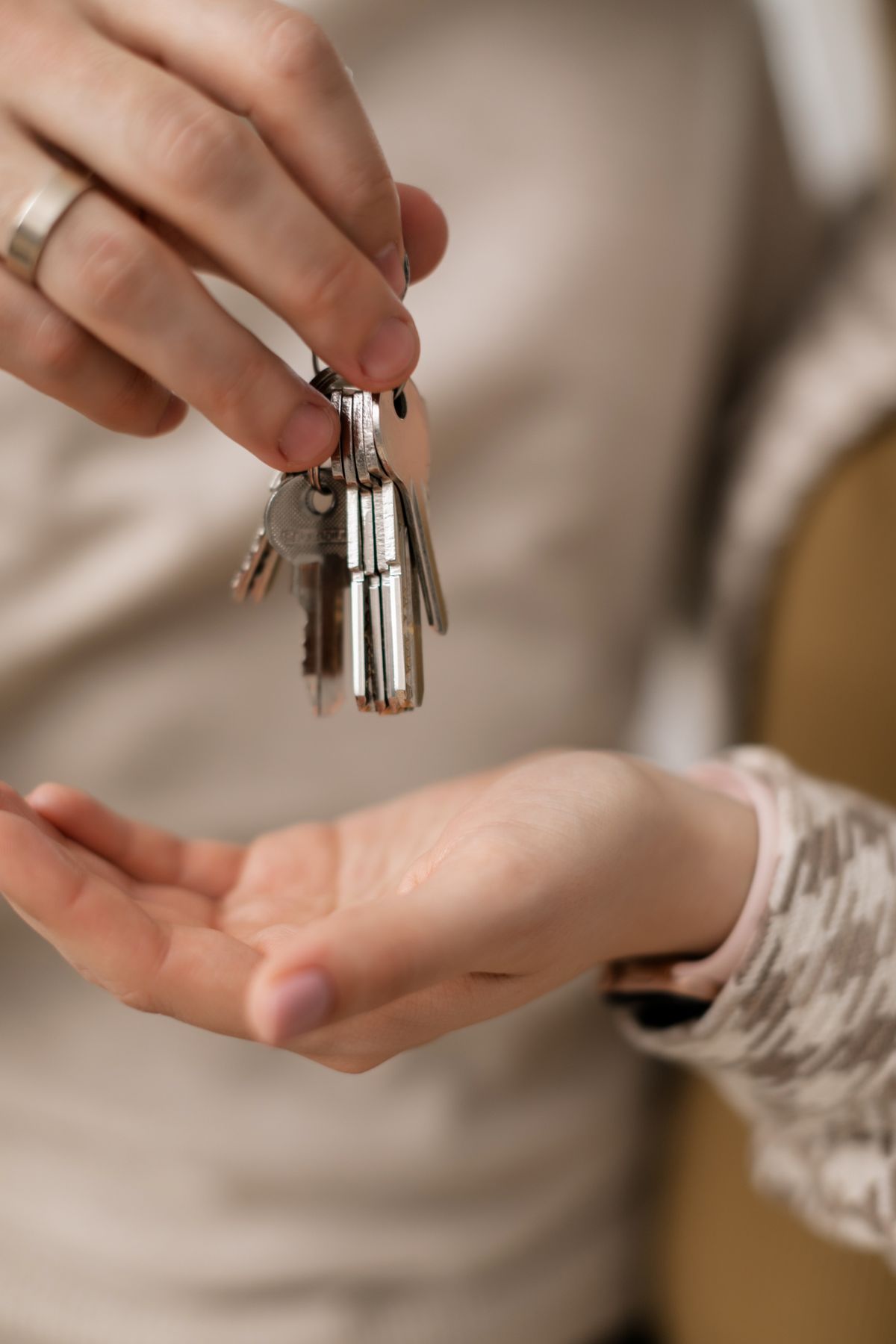 Keys being handed over for a completed new home